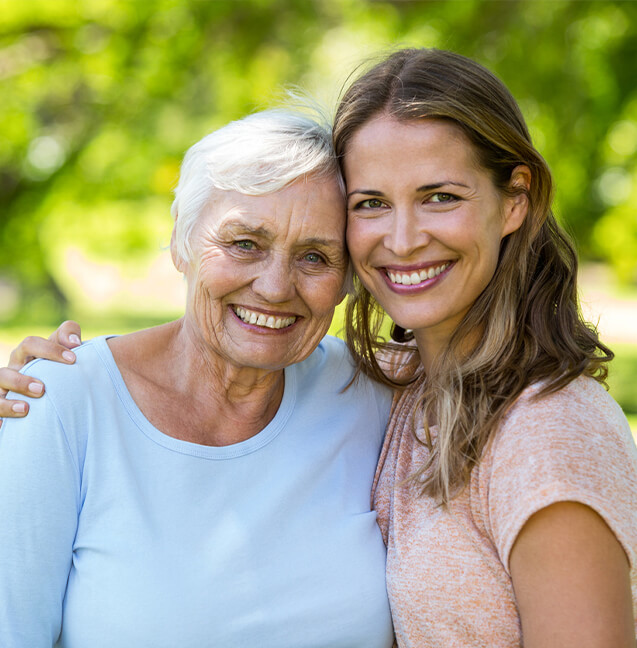 mother and daughter smiling