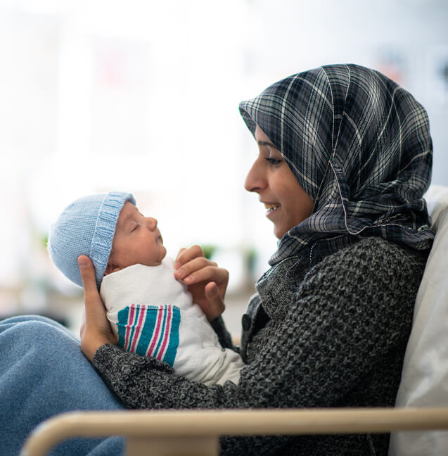 woman holding baby