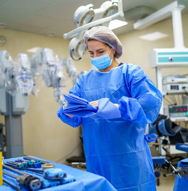doctor preparing for da vinci robotic surgery