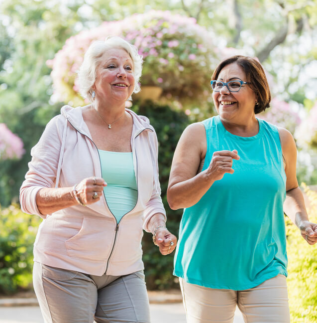 two older women jogging 
