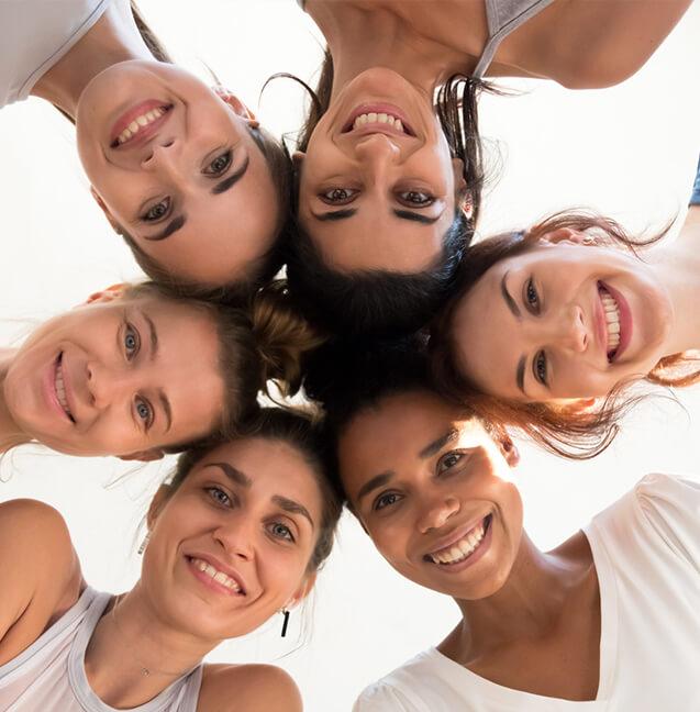 group of women looking down